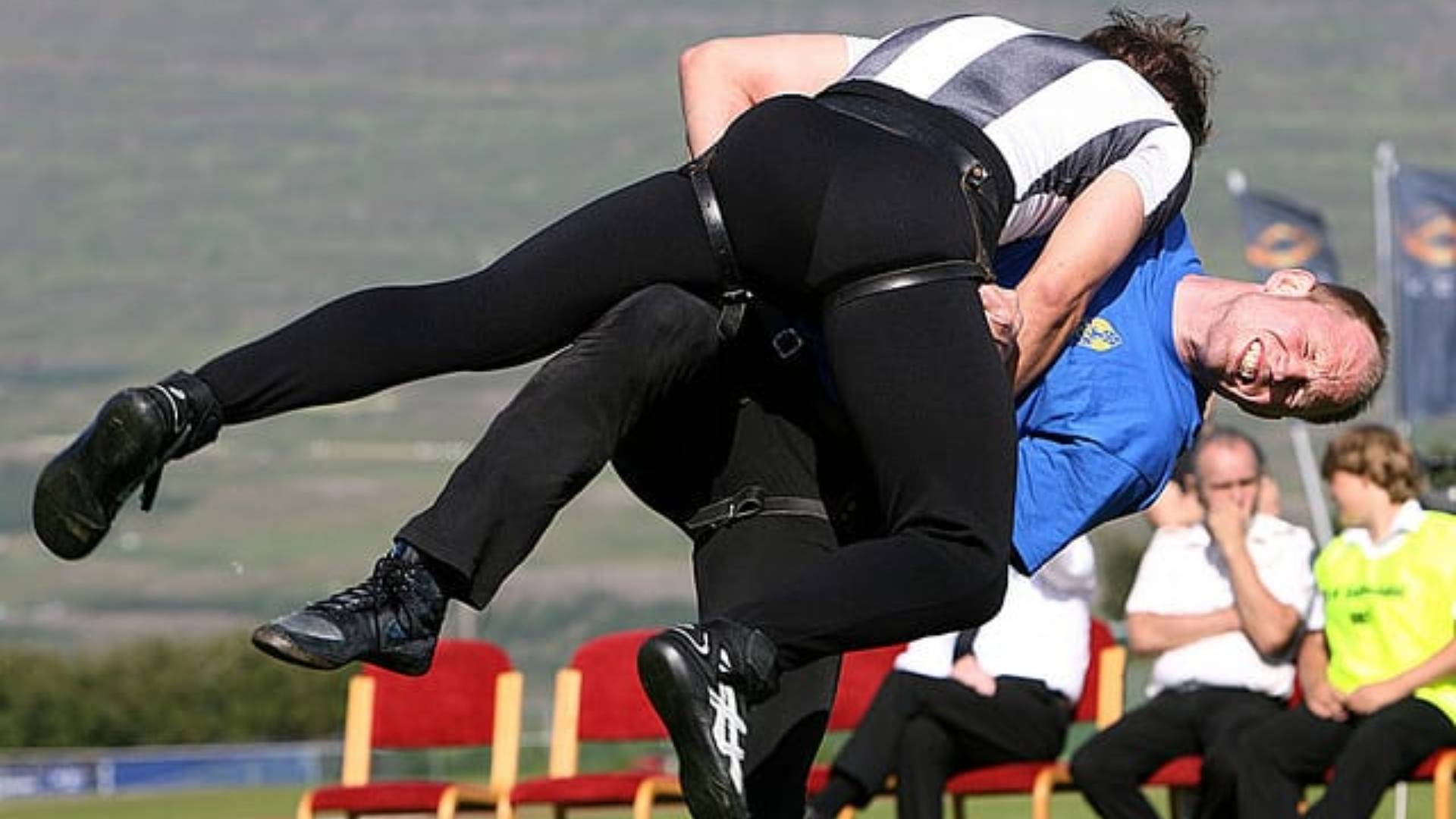 men doing icelandic glima wrestling