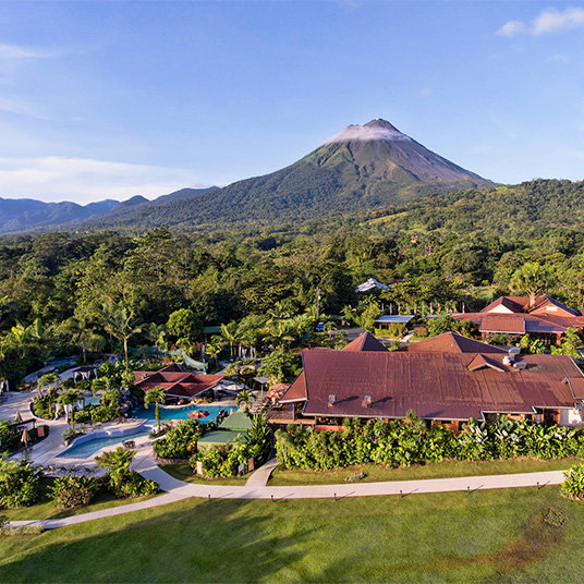 The Arenal Springs Hotel in front of the Arenal Volcano