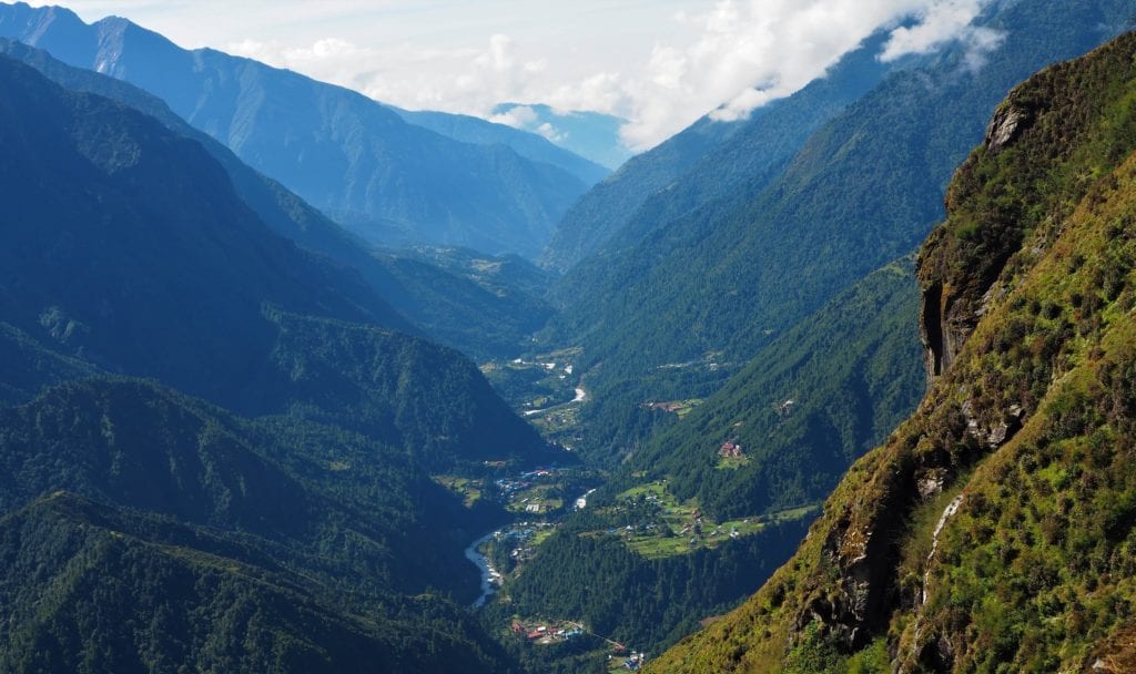 A birdseye view of the Dudh Kosi and Bhote Kosi rivers framed by woodland