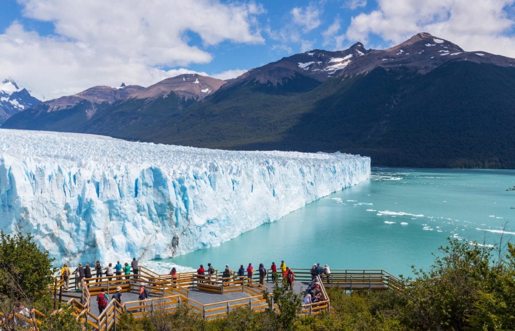 People observing the view of the Perito Moreno Glacier in Argentina