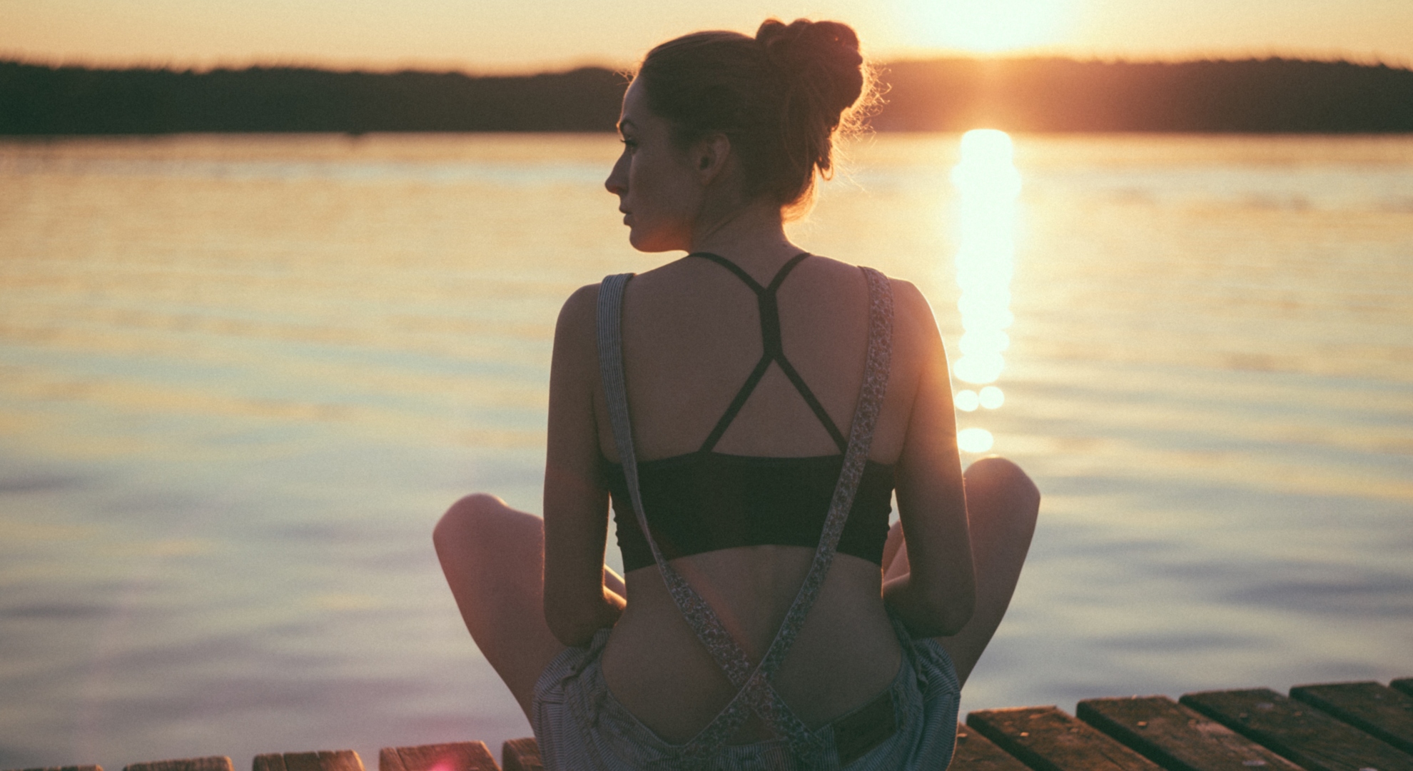 woman alone by lake