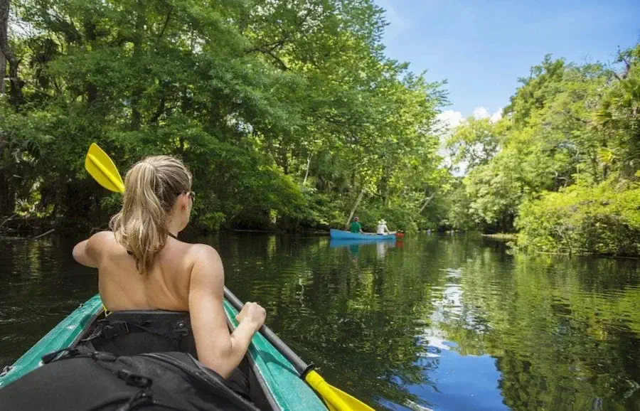 woman kayaking in costa rica