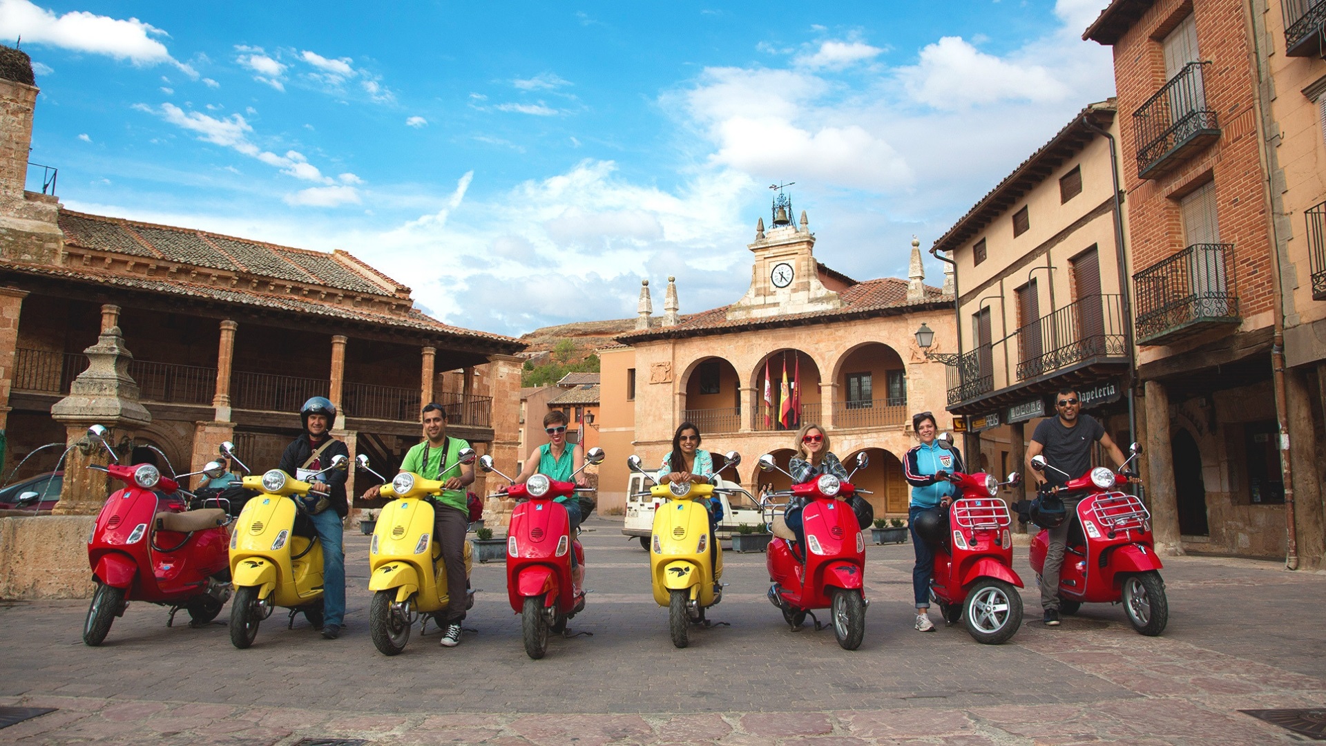 Travellers on Vespas in Spain