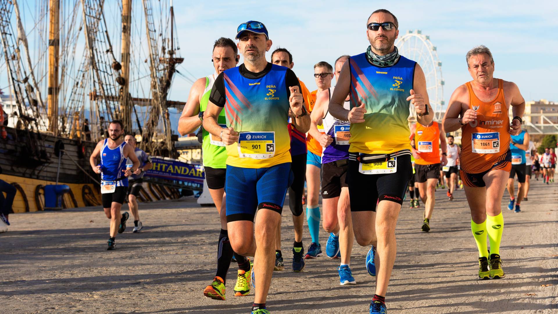 men in 40s and 50s running a marathon