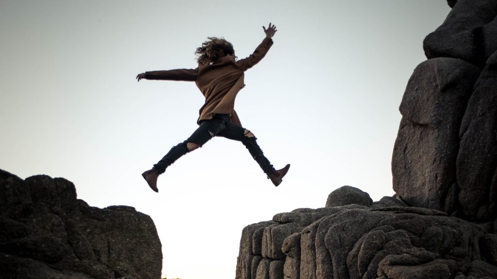 A woman making a leap of faith