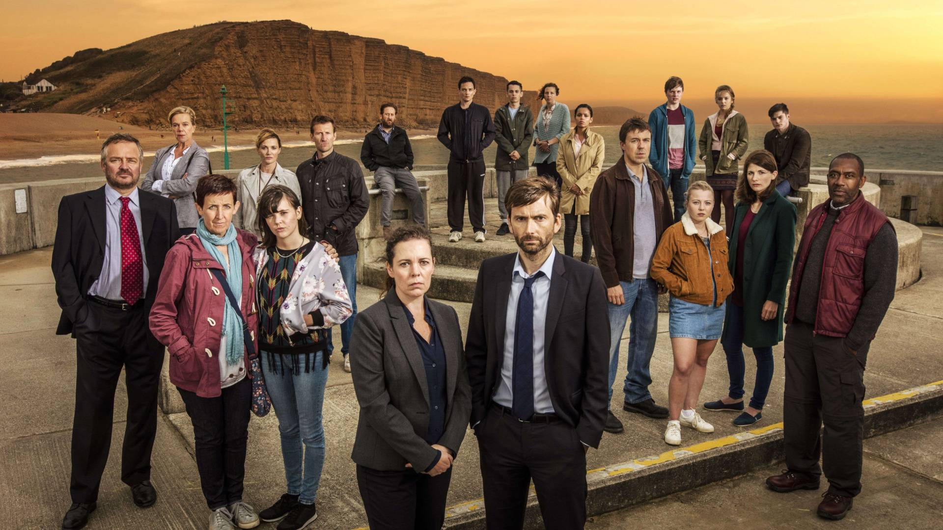 photo of teh cast of broadchurch on west bay beach dorest