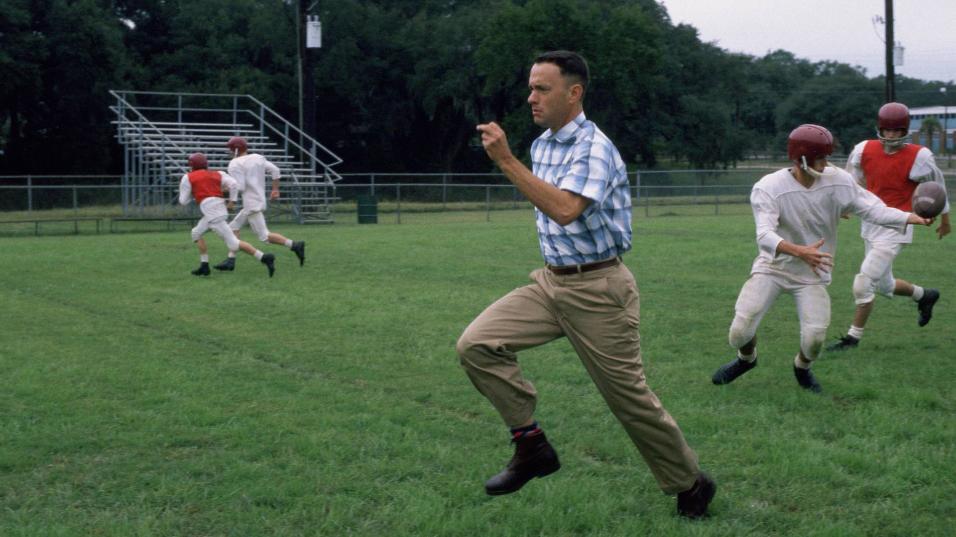 forrest gump aka tom hanks running through a football game