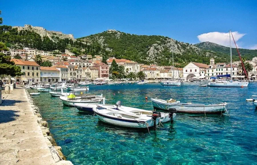 Small white boats in the sea of Hvar Island, Croatia