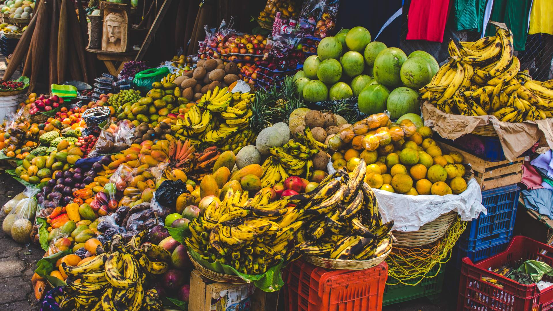 Market stall featuring stacks of fruit in Guatemala