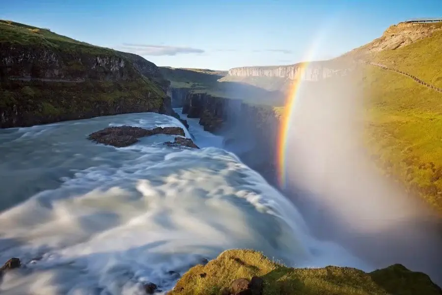 A rainbow in the Gullfoss waterfall in Iceland